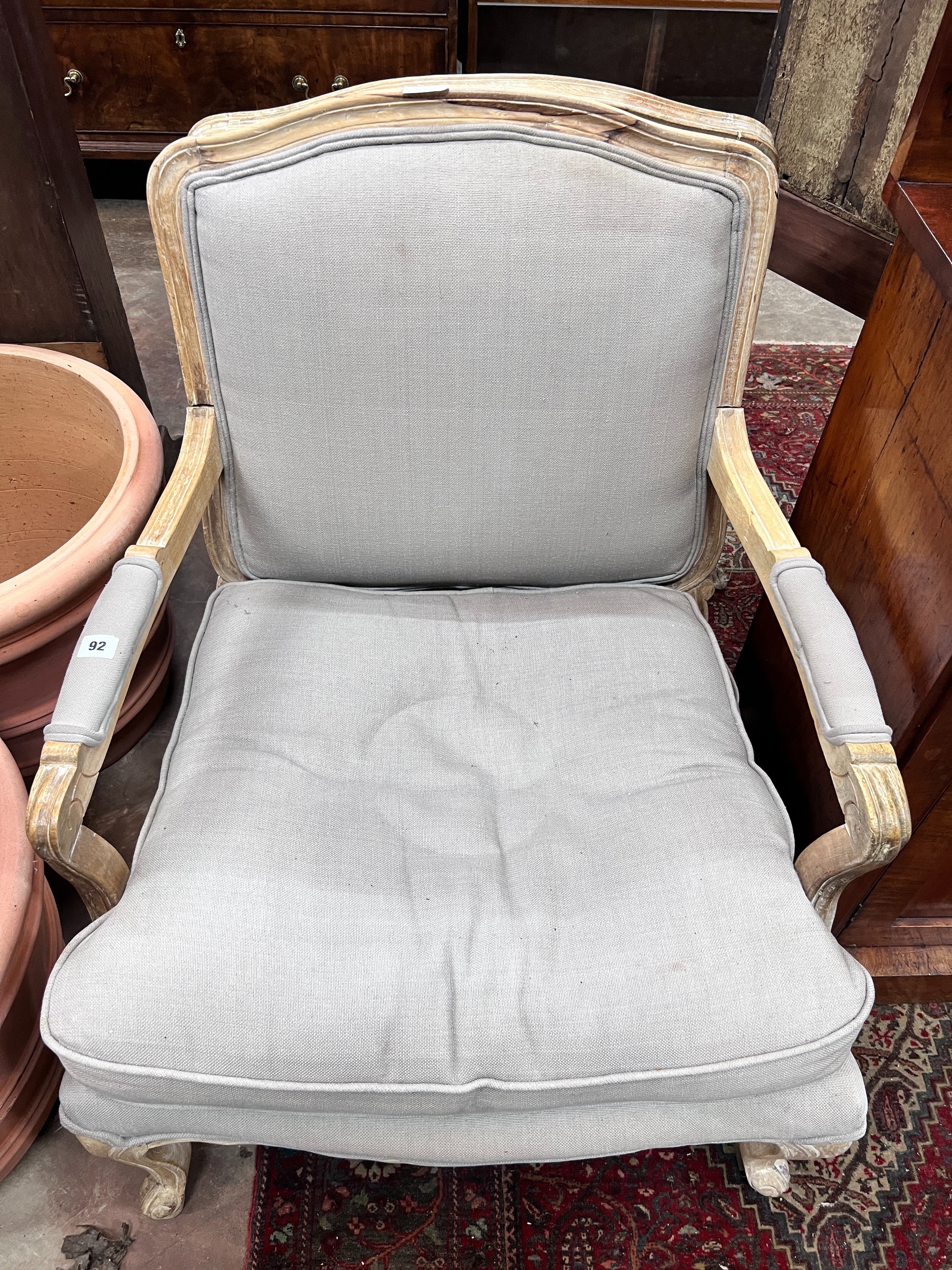 A pair of Louis XVI style upholstered open armchairs, width 68cm, depth 70cm, height 88cm *Please note the sale commences at 9am.